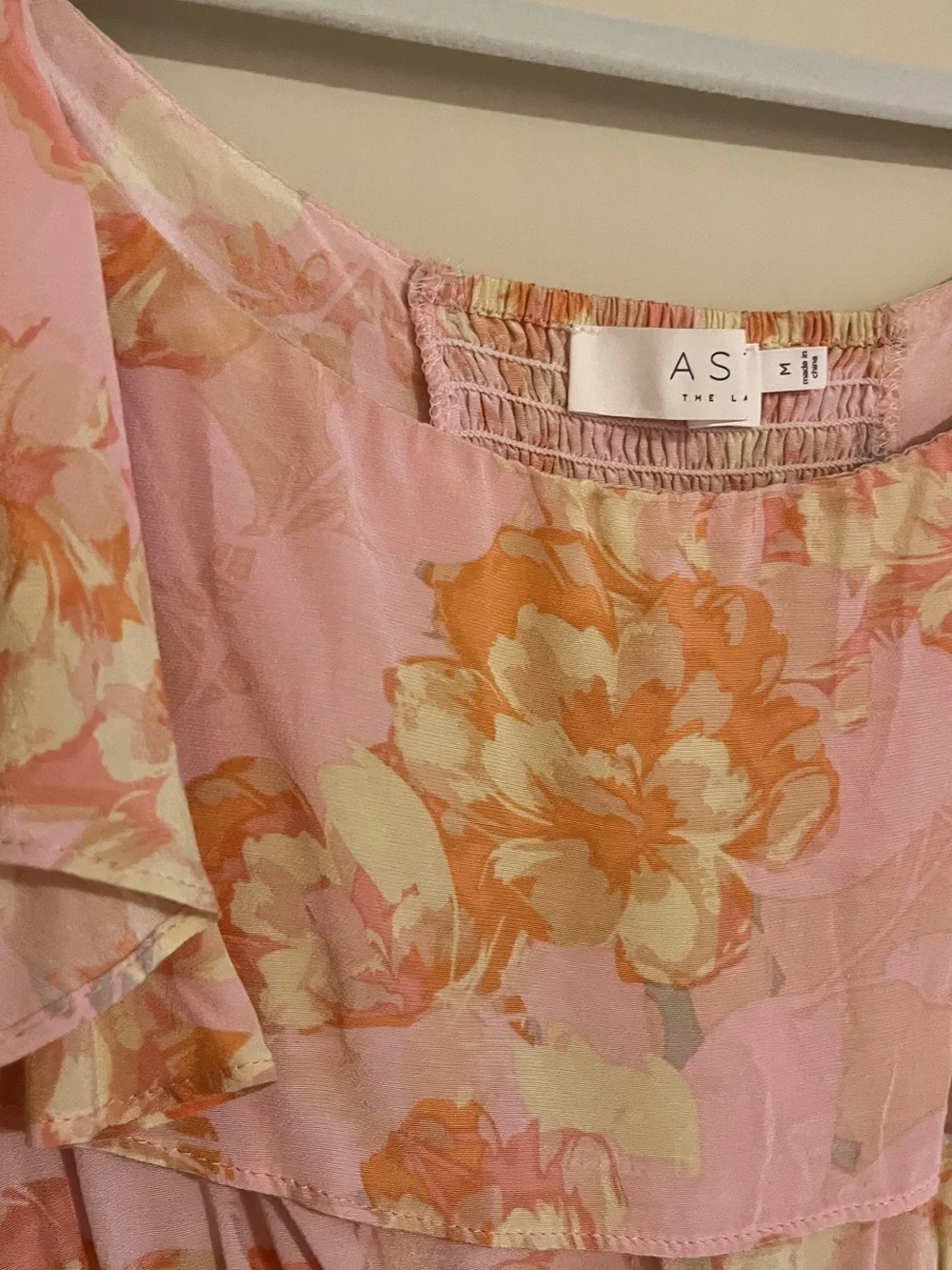 Astr Floral Ruffle Smocked Top in Pink & Peach